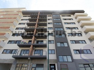 NEW BUILDING VOGOŠĆA! Functional three-room apartment with an area of ​​67.36 m2 on the fourth floor in a residential and commercial building in the final phase of construction, Rosulje neighborhood.