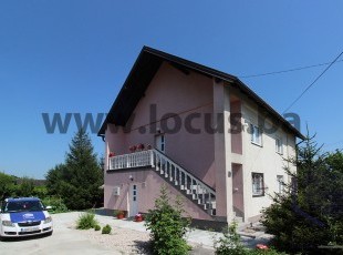 Quality built house with a spacious, landscaped yard and garage on a plot of 724sqm in a quiet and family environment, village of Donji Kotorac, Municipality of Ilidža