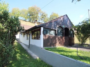 Registered house with a landscaped and spacious yard on a plot of 1,036m2 in a quiet environment in an accessible location in the settlement of Donja Jošanica, Vogošća