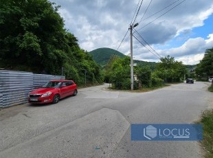 Land area of ​​11,591 m² with open views and potential for construction, located next to the Porsche showroom near the main road, Blažuj, Ilidža